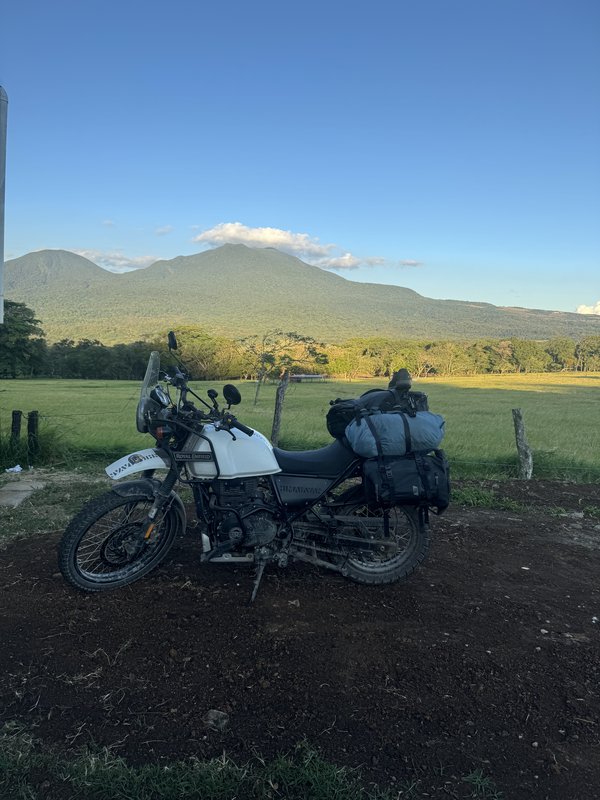 The Himalayan with a volcano backdrop, Costa Rica